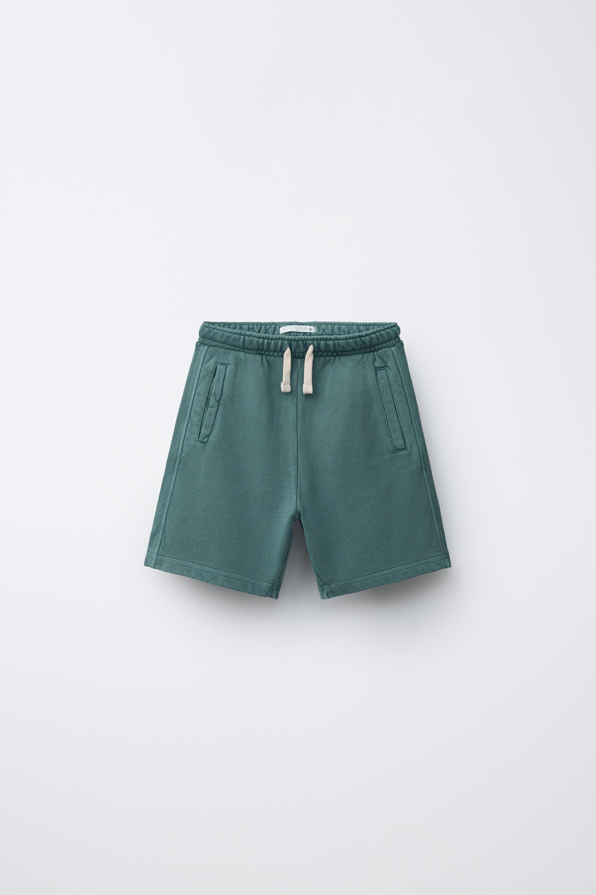GARMENT DYED LOGO PLUSH SHORTS